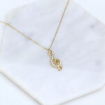 naszyjnik złoty z wiszącym kluczem wiolinowym, klucz wiolinowy z cyrkoniami, złoty klucz wiolinowy, złoto 585