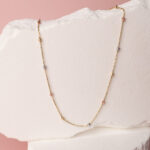 Naszyjnik złoty kulki diamentowane w trzech kolorach