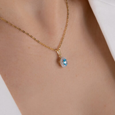 Zawieszka złota z błękitnym kamieniem i cyrkoniami